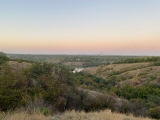Obraz premium sunset over the river