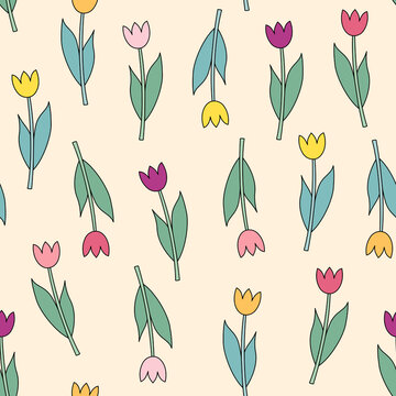 Pink, violet, yellow, orange tulips on pastel background
