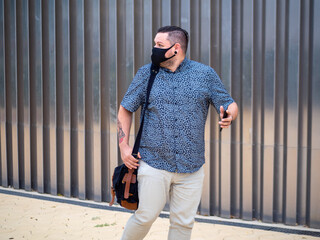 Shot of a man in a medical mask - new normal