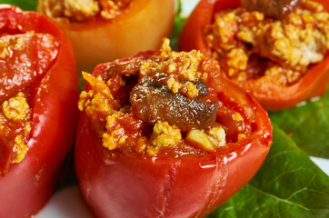 Mushroom, minced meat, tomato stuffed baked peppers