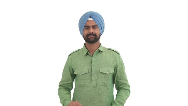 Excited Indian man showing wow hand gesture by both hands. O-key sign. Isolated on white background