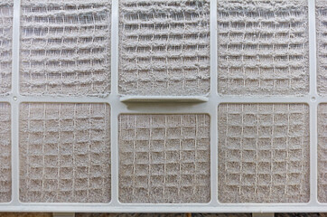 close up on air conditioner filter is very dirty after remove from unit wait clean