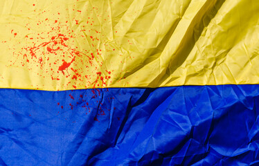blood stains on the flag of Ukraine