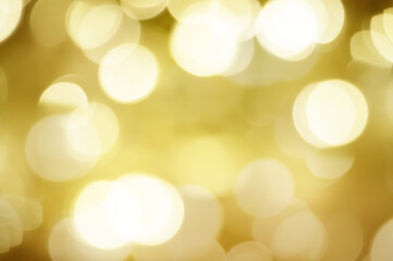 Disposessory abstract Christmas background yellow.Abstract sunny bokeh on orange.