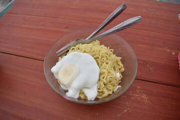 noodle and egg food on the table