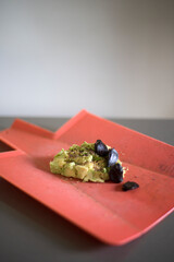 Avocado with black garlic