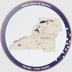 Round button with detailed map of Leon County in Florida, USA.