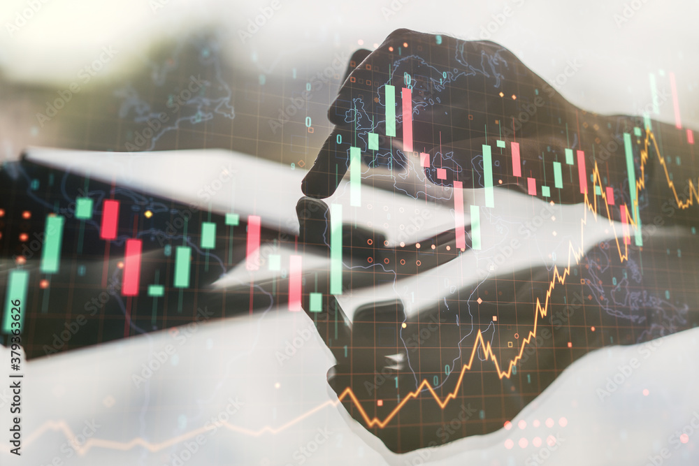 Poster multi exposure of abstract financial graph with world map and hand working with a digital tablet on 