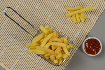 portion of potato chips in a metal basket.