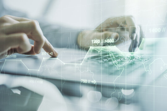 Multi exposure of abstract statistics data hologram interface with hands typing on computer keyboard on background, computing and analytics concept