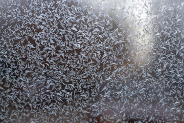 fine frosty pattern on the glass background