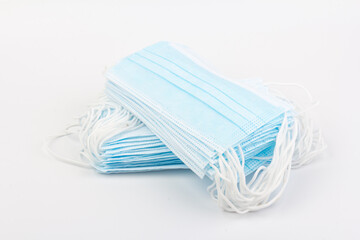 Blue medical masks isolated on white background. Face mask protection against pollution, virus, flu and coronavirus.