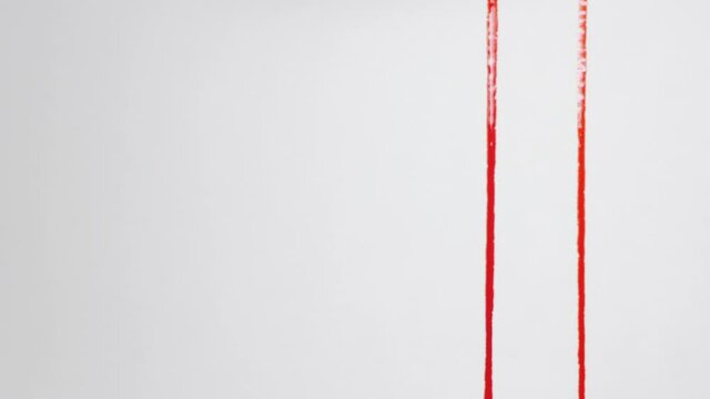 Red Liquid Painted As A Natural Blood Flowing On White Backdrop