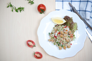 Quinoa salad with on a wooden table.Superfood and healthy eating concept.Top view
