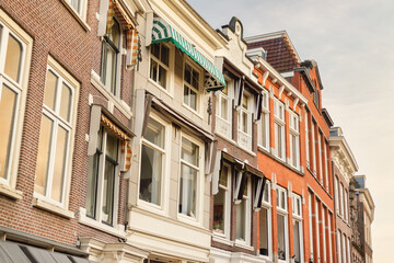 Fototapeta na wymiar Row of ancient houses in the Dutch city center of Leiden