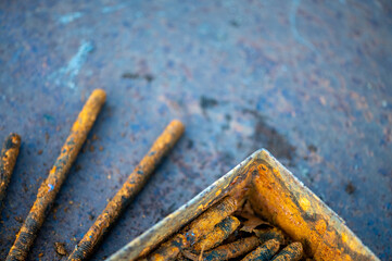 metal stud, fasteOld metal studs covered in rust, close-up, selective focus.ning part, rust