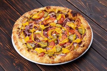 pizza on the wooden background