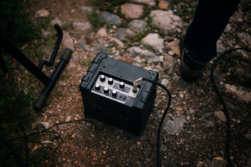 Close up of guitar amplifier and guitar jack, music concept.
