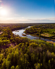 Naklejka premium Areal countryside view from drone with small river Venta.