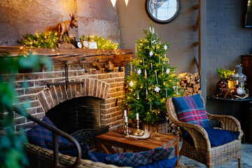 Christmas decor of the house with a fireplace. cozy holiday interior of a country house. new year.