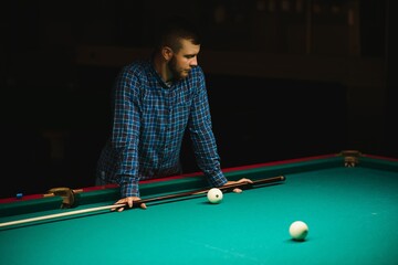 Playing billiard - Close-up shot of a man playing billiard