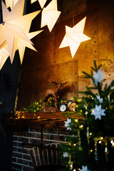 the details. Christmas decor of the house with a fireplace. cozy holiday interior of a country house. new year.