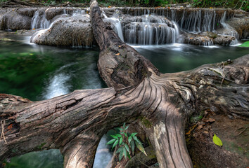 Waterfalls with a timber like a bridge, Erawan waterfall, Kanchanaburi,Thailand.
