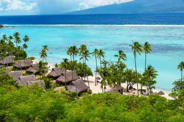 Luxury travel vacation with beach villas on Moorea Island, French Polynesia. - obrazy, fototapety, plakaty