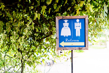 Toilet sign made of wood