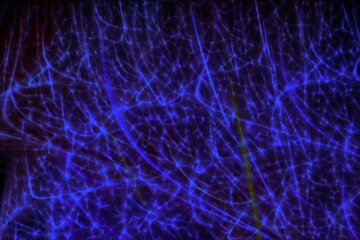 Blue spider web of rays and flashes