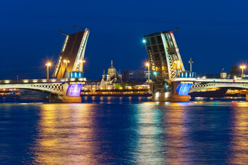 Fototapeta na wymiar Saint Petersburg - view of the Annunciation Bridge and the Church of the Assumption of the Blessed Virgin Mary.