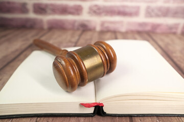 Close up of gavel on a open book with copy space 