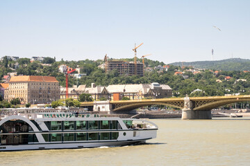 Naklejka premium The panoramic cityscape of the historical Buda castle, the old architecture of the Buda hill and the Danube river in Budapest, Hungary