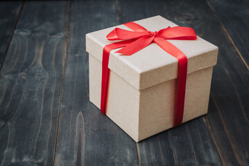  brown gift box on wooden table background with copy space.