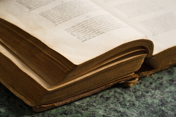 Old book close-up on marble