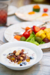 delicious healthy yogurt eat with crispy nut and grains