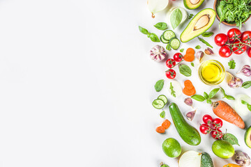 Organic fresh raw vegetables flatlay. Healthy food cooking background with various vegetable salad ingredients.  Vegetarian fresh raw food concept. Top view, copy space