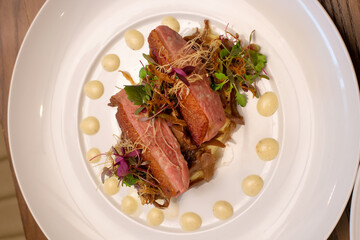 fine roasted duck eat with vegetable and mash potato