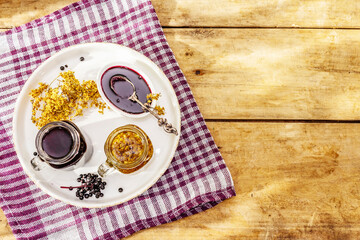 Elderberry tea from ripe berries and dried flowers