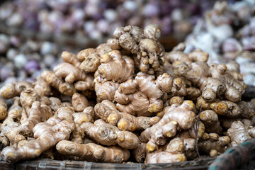 Dry ginger for sale at street food market in the old town of Hanoi, Vietnam