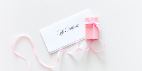 Gift Certificate and pink present box 