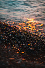 Stones on the beach and the shoreline at headlands beach in ohio