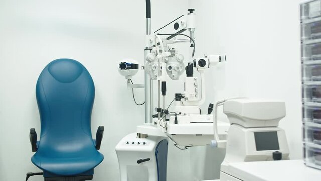 Eye clinic with autorefractor , slit lamp and eye diagnostic tools. High quality 4k footage