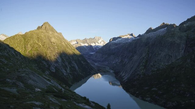 Schreckhorn In The Bernese Alps Seen From The Grimsel Mountain Pass On A Sunny Summer Day In Switzerland - Lake Grimsel (Grimselsee) Is An Artificial Lake To Produce Electricity. - timelapse
