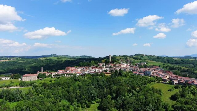 A flight above Murazzano - an aerial view of a typical Italian village on top of the hill in Langhe shire (Piedmont)