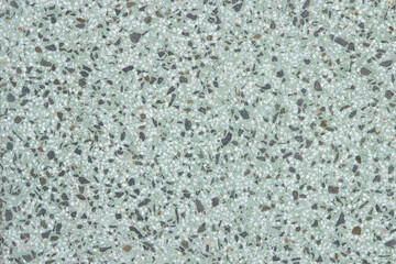 Sidewalk facing concrete tiles. Turquoise green granite and marble sample.