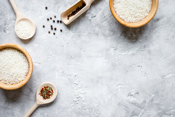 rice for paella on stone background top view mock up