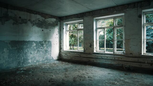 Destroyed school in Beslan after the terrorist attack. Old empty school corridors