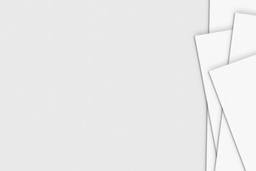 Stacked pile of papers on off white paper background