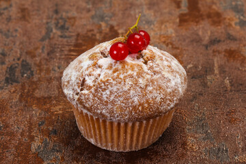 Sweet tasty muffin with red currants